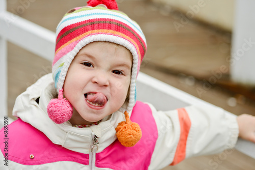 Photo: girl showing tongue girl showing tongue