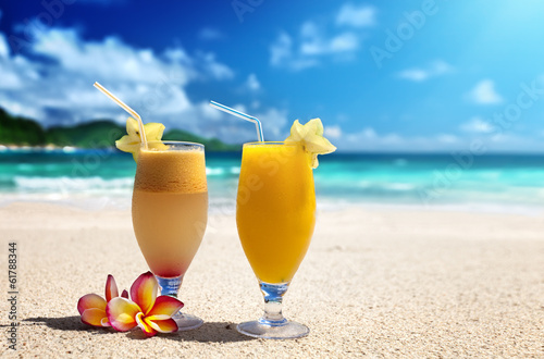 Photo: fresh fruit juices on a tropical beach fresh fruit juices on a tropical beach