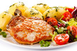 Grilled steak, boiled potatoes and vegetable salad Grilled steak, boiled potatoes and vegetable salad