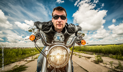 Photo: Funny Biker racing on the road Funny Biker racing on the road