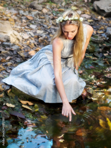 Photo: Beautiful Fairytale Princess Sitting By Water Pond Beautiful Fairytale Princess Sitting By Water Pond