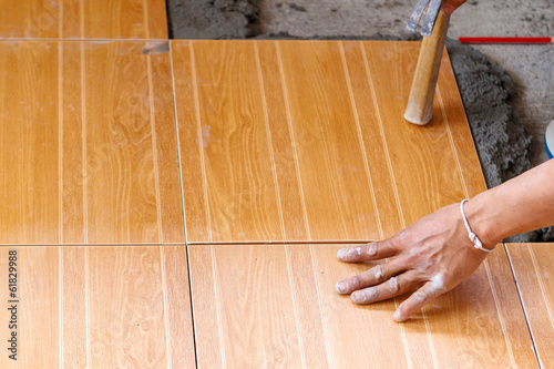 Photo: floor tile installation for house building floor tile installation for house building