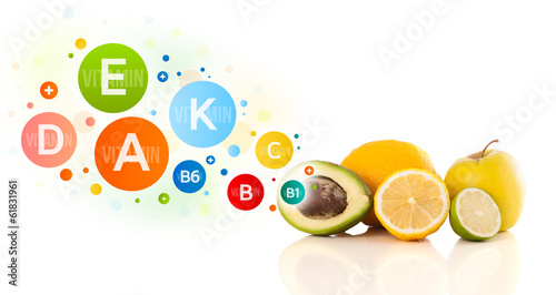 Photo: Healthy fruits with colorful vitamin symbols and icons Healthy fruits with colorful vitamin symbols and icons