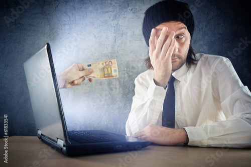 Photo: Online money funds, surprised businessman receiving cash over in Online money funds, surprised businessman receiving cash over in