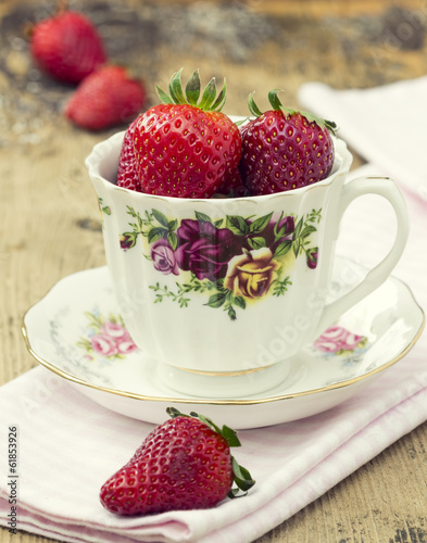 Photo: Strawberry on rustic wooden table Strawberry on rustic wooden table