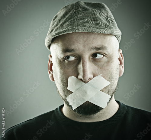 Photo: Man forbidden talking concept Man forbidden talking concept