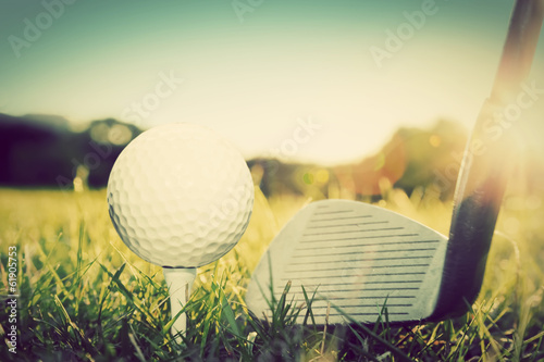 Fototapeta na wymiar Playing golf, ball on tee and golf club. Vintage, retro style
