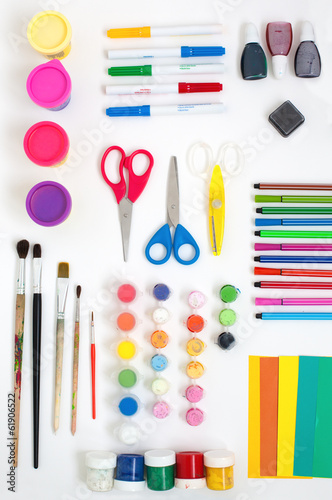 Photo: Colorful set of tools for painting drawing modeling and applique Colorful set of tools for painting drawing modeling and applique