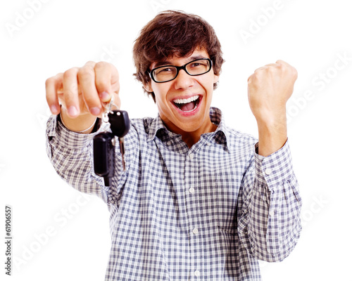 Photo: Happy student with car keys closeup Happy student with car keys closeup