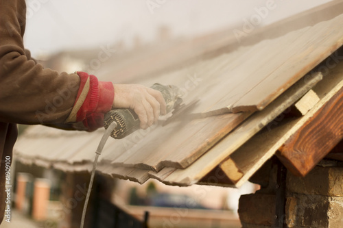 Photo: Roofer - Sanding Roof Tiles Roofer - Sanding Roof Tiles