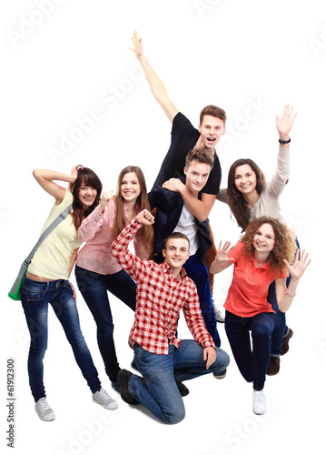 Photo: Casual group of excited friends isolated on white Casual group of excited friends isolated on white