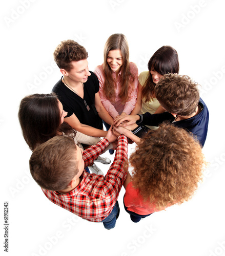 Photo: Pile of hands - Successful business team celebrating success Pile of hands - Successful business team celebrating success