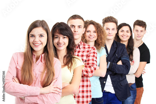 Photo: Young people standing in a row Young people standing in a row