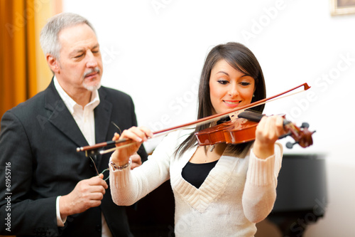 Photo: Woman playing violin Woman playing violin