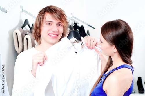 Photo: Shopping smile couple at the mall Shopping smile couple at the mall
