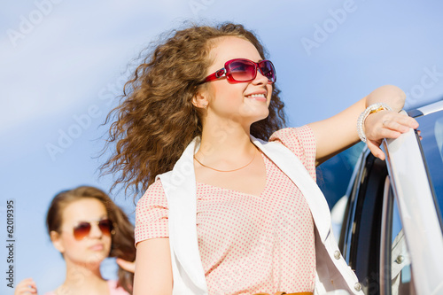 Photo: Women near car Women near car