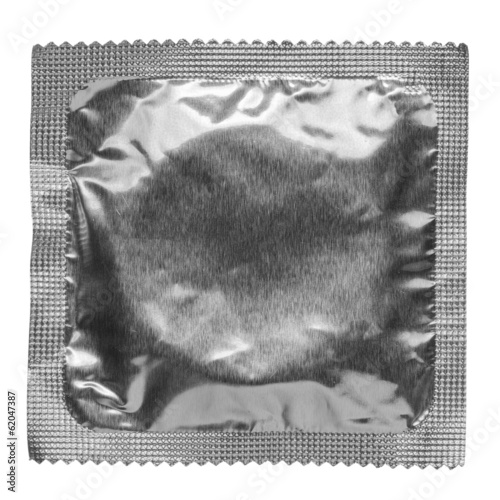 Photo: Condom isolated on white background Condom isolated on white background