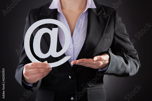 Photo: Businessperson With Email Symbol Businessperson With Email Symbol