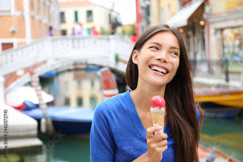 Photo: Woman in Venice, Italy eating Ice cream Woman in Venice, Italy eating Ice cream