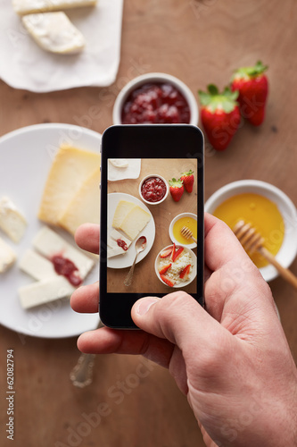 Photo: Smartphone taking picture of breakfast Smartphone taking picture of breakfast