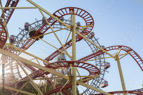 Photo: Ferris Wheel and Roller Coaster in Vienna, Austria. Ferris Wheel and Roller Coaster in Vienna, Austria.