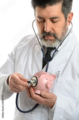 Photo: Hispanic Doctor Using Stethoscope Hispanic Doctor Using Stethoscope