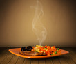 Fresh delicious home cooked food with steam Fresh delicious home cooked food with steam