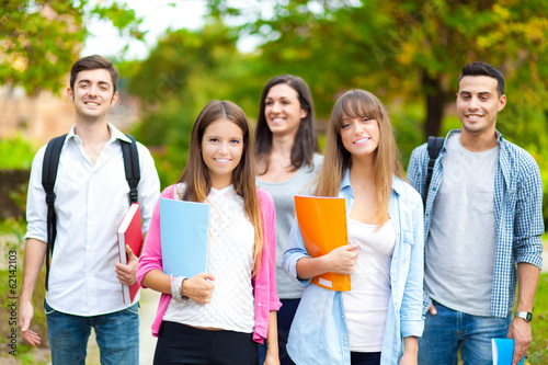 Photo: Smiling group of student at the park Smiling group of student at the park