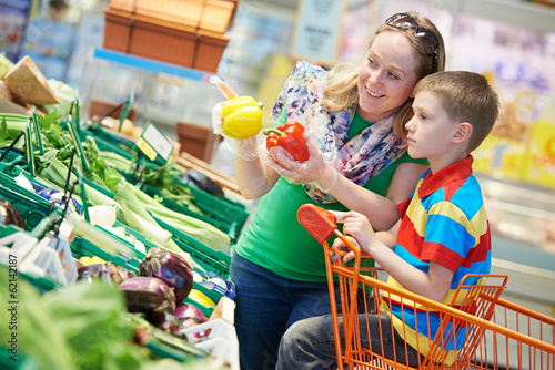 Photo: Family shopping at supermarket Family shopping at supermarket