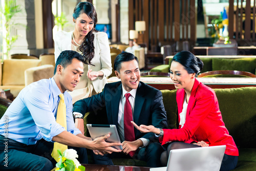 Photo: Asian businesspeople having meeting Asian businesspeople having meeting