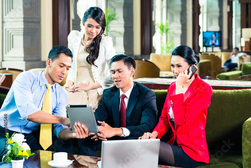 Photo: Asian businesspeople having meeting Asian businesspeople having meeting
