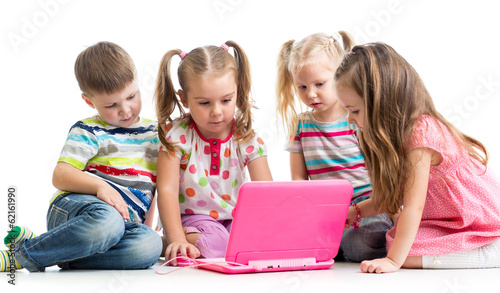 Photo: group of children friends at the laptop group of children friends at the laptop