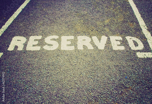 Photo: Retro look Reserved parking sign Retro look Reserved parking sign