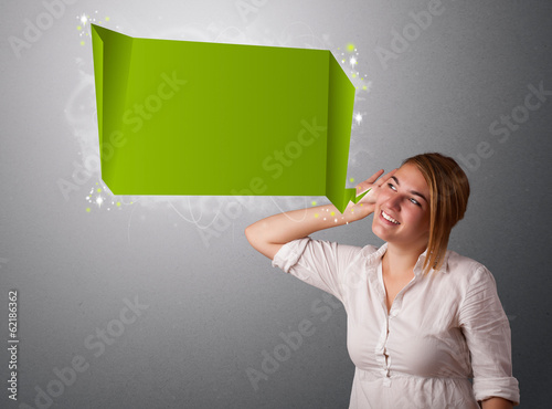 Photo: Young woman with modern speech bubble Young woman with modern speech bubble