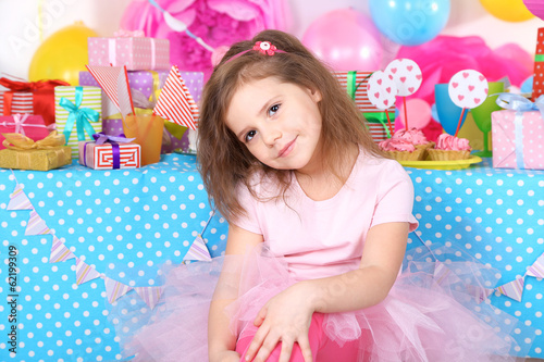 Photo: Pretty little girl celebrate her birthday Pretty little girl celebrate her birthday