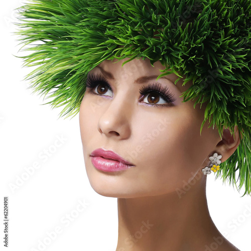 Photo: Spring Woman. Beautiful Girl with Green Grass Hair Spring Woman. Beautiful Girl with Green Grass Hair