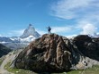 hiker on Matterhorn Mountain in Switzerland hiker on Matterhorn Mountain in Switzerland