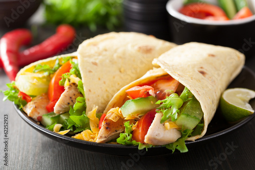 Photo: mexican tortilla wrap with chicken breast and vegetables mexican tortilla wrap with chicken breast and vegetables