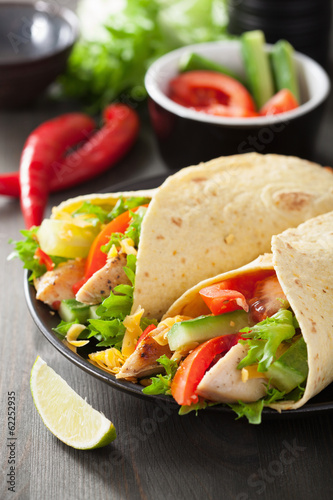 Photo: mexican tortilla wrap with chicken breast and vegetables mexican tortilla wrap with chicken breast and vegetables