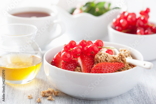 Photo: healthy breakfast with granola and strawberry healthy breakfast with granola and strawberry