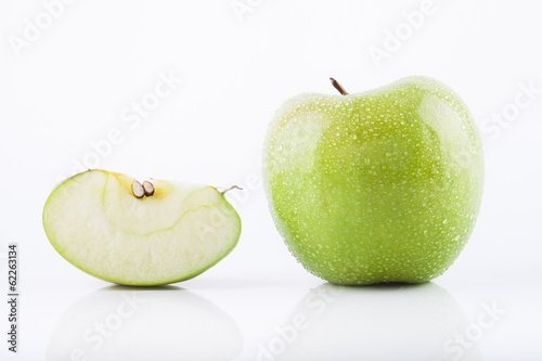 Photo: Green Granny Smith apple with waterdrops Green Granny Smith apple with waterdrops