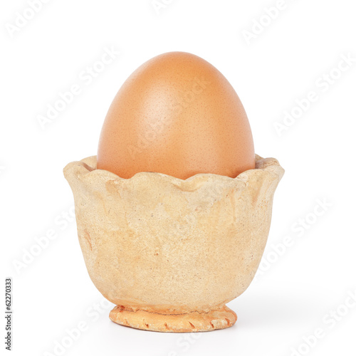 Photo: brown egg in handmade holder brown egg in handmade holder