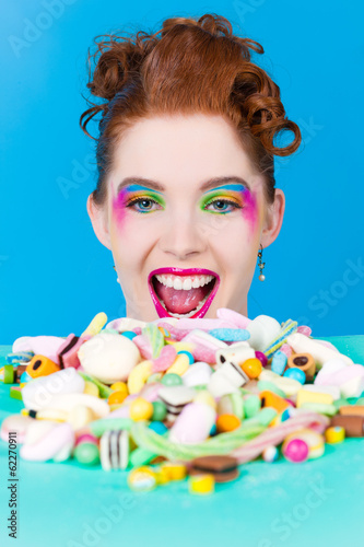 Photo: Girl with sweet goodies and candy Girl with sweet goodies and candy