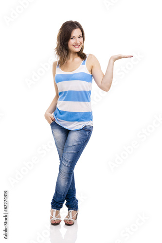 Photo: Beautiful young woman smiling with thumbs up Beautiful young woman smiling with thumbs up