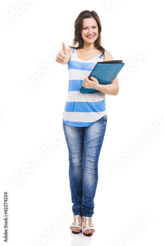 Photo: Beautiful young student, isolated over white background Beautiful young student, isolated over white background