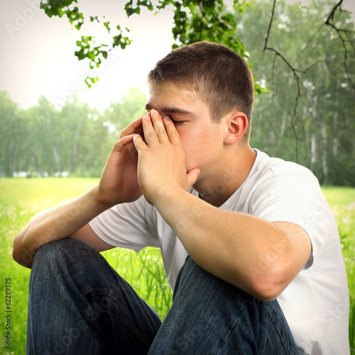 Photo: Sad Teenager outdoor Sad Teenager outdoor