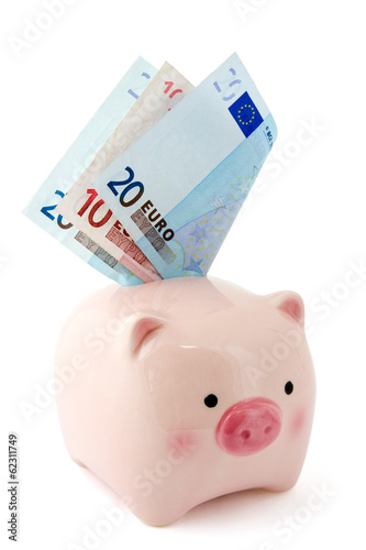 Photo: Piggy bank with Euro bills Piggy bank with Euro bills
