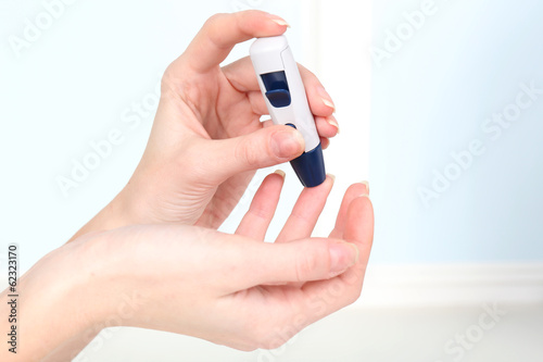 Photo: Measuring glucose level blood close-up Measuring glucose level blood close-up