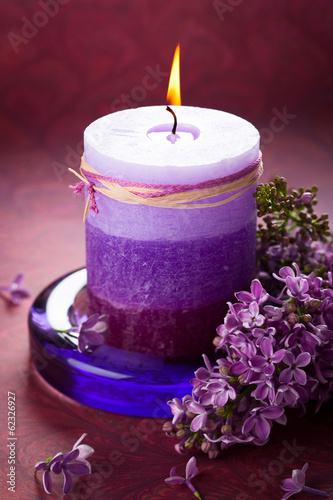 Photo: Candle and lilac Candle and lilac