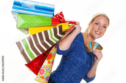 Photo: Frau mit Einkaufstaschen beim Shopping Frau mit Einkaufstaschen beim Shopping